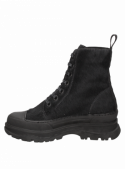 Botín de cuero negro con caña de 14 cm y forro de fibra, ideal para un look vanguardista.