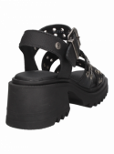 Elegante sandalia negra de cuero para mujer, ideal para días cálidos, con diseño vanguardista.