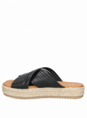 Sandalia de cuero negro para mujer con punta abierta, ideal para días cálidos, estilo vanguardista.