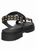 Calzado de mujer en cuero negro, estilo tachas, ideal para el verano.