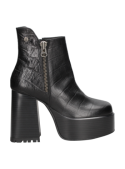 Botín de cuero negro para mujer, con detalles sofisticados y textura visual, adecuado para salidas informales.
