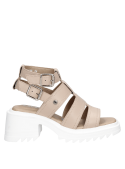 Sandalia nude de cuero para mujer con plataforma robusta y suela dentada, ideal para salidas informales.