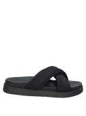Calzado textil negro, suela plana y gruesa, ideal para paseos urbanos o salidas informales en verano.