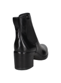 Botín de cuero negro estilo Chelsea para mujer, con suela de goma que ofrece buen agarre y estabilidad diaria.