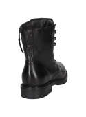 Botín negro de cuero para mujer con costuras reforzadas, combinando durabilidad y estilo versátil para uso diario.