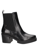 Botín Chelsea negro de cuero para mujer, con suela robusta que asegura durabilidad y buen aislamiento del suelo.