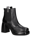 Botín Chelsea negro de cuero para mujer con diseño elegante, tacón ancho y caña media que ofrece soporte y protección.