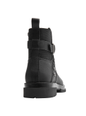 Botín de cuero negro para mujer, estilo urbano con taco de grosor medio, ideal para atuendos casuales y semi-formales.