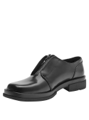 Zapato negro de cuero para mujer, estilo casual, con cierre de cremallera central y suela robusta, ideal para oficina.