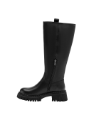 Bota de cuero negro para mujer, diseño moderno con tirador trasero y suela gruesa, adecuada para caminar en invierno.