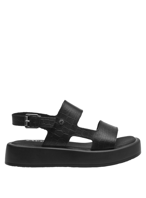 Sandalia de mujer en cuero negro, ideal para atuendos normcore.