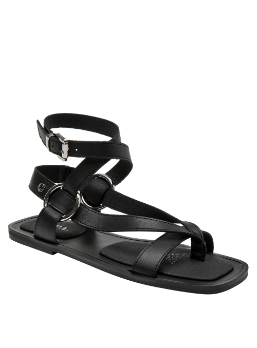 Calzado plano minimalista en cuero negro para mujer, cómodo y elegante.