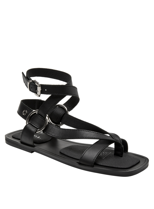 Calzado plano minimalista en cuero negro para mujer, cómodo y elegante.