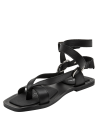 Sandalia negra plana de cuero para mujer con diseño minimalista y punta abierta.