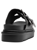 Sandalia de cuero negro para mujer con base estable y altura moderada.