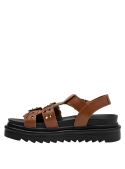 Vista del material de cuero camel en sandalia casual para mujer con suela estable.