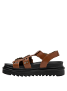 Vista del material de cuero camel en sandalia casual para mujer con suela estable.