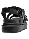 Sandalia negra de cuero minimalista con punta abierta y suela plana de 5.5 cm para mujer.