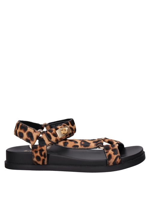 Cuero animal print en sandalia plana de mujer, estilo minimalista para un toque casual y ligero.