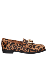 Elegante mocasín de cuero animal print, empeine limpio, perfecto para combinar con jeans o falda.