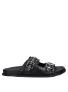 Sandalia femenina de cuero negro, diseño minimalista con taco cómodo de 3 cm.