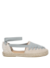 Silueta limpia y liviana de alpargata beige de cuero para mujer.
