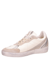zapatilla blanca de cuero para mujer con diseño limpio y suela plana de 3,3 cm