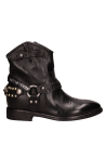 Botín de cuero negro para mujer, ideal para looks casuales y semi-formales.