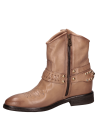 Botín vaquero beige de cuero con punta redonda y taco bloque, ideal para mujer.