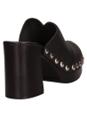 Zapato de cuero negro para mujer, con taco de 9 cm y silueta limpia.