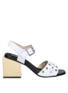 Sandalia casual de mujer en cuero blanco, versátil y cómoda.