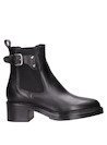 Botín de mujer en cuero negro, diseño casual, ideal para un look moderno.