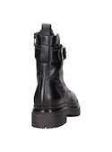 Botín negro de cuero para mujer, textura suave, combina bien con vestidos oversized y jeans skinny.