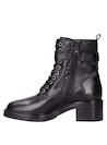 Calzado de mujer en negro, botines de estilo vanguardista para un impacto visual.