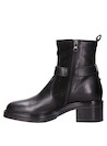 Botín negro de cuero para mujer, altura de taco de 5 cm, ideal para un look diario con jeans ajustados.