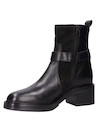 Botín negro de cuero para mujer, estilo casual, ideal para salidas urbanas.