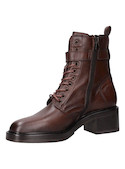 Botín de cuero brown para mujer, estilo urbano, ideal para looks audaces y casuales.
