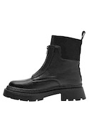 Botín negro de cuero para mujer, elegante y cómodo, perfecto para un look audaz y moderno.