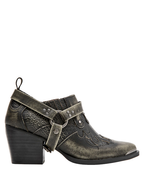Zapato multicolor de cuero para mujer, destaca por su diseño único y su carácter urbano.