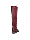 Bota de cuero burdeos con punta redonda y acabado mate, perfecta para combinar con jeans.