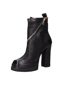Botín negro de cuero para mujer con taco bloque de 11.5 cm, ideal para un estilo urbano y moderno.