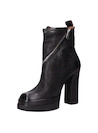 Botín negro de cuero para mujer con taco bloque de 11.5 cm, ideal para un estilo urbano y moderno.