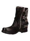 Botín negro de mujer en cuero italiano, estilo urbano, ideal para looks audaces y casuales.