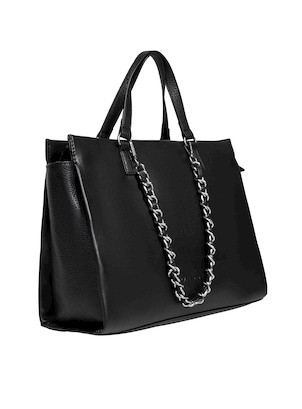 Tote bag negra con bolsillo trasero con cierre metálico, ideal para un acceso rápido y práctico.