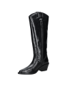 Botas de mujer en cuero negro, perfectas para un look urbano, combinadas con jeans skinny.