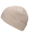 Gorro beanie beige para mujer, estilo urbano, ideal para actividades al aire libre.